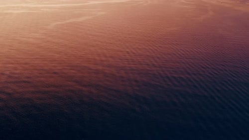 Meereslandschaft, Meeresoberfläche bei Sonnenuntergang, Blick von oben nach unten