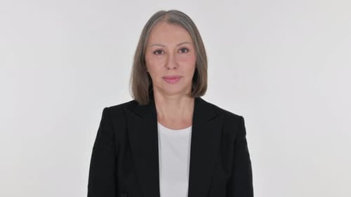 Senior Businesswoman with Thumbs Up on White Background