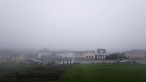 Fog Shrouded Village in Rural Location