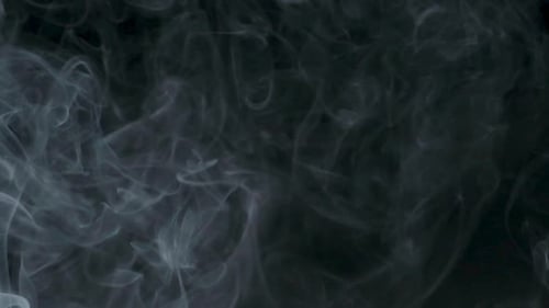 Abstract White Smoke Drifting on Black Background