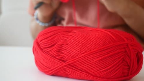 Hand Close Up Crocheting with a Hook Wool Yarn Creative Craft