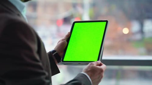 Businessman Hands Touching Chroma Key Tablet Standing in Modern Office Closeup