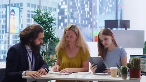 Business Meeting: Contract Signing in Modern Office