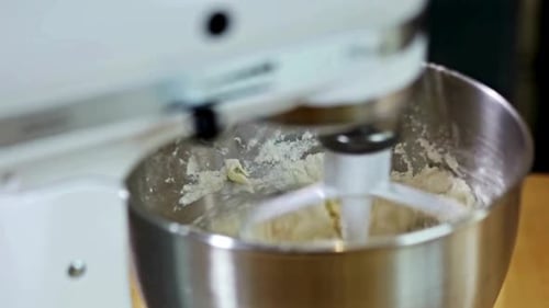 Electric Mixer Blending Butter and Flour for Baking