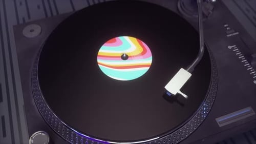 Vinyl record is being played on a turntable. Closeup of a vinyl record slowly rotating on a dark bac