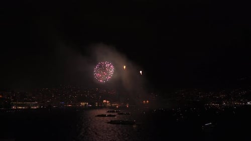 Fireworks Light Up City at Night