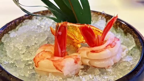 Slow Zoom in of Fresh Shrimp Sashimi on Crushed Ice Bed
