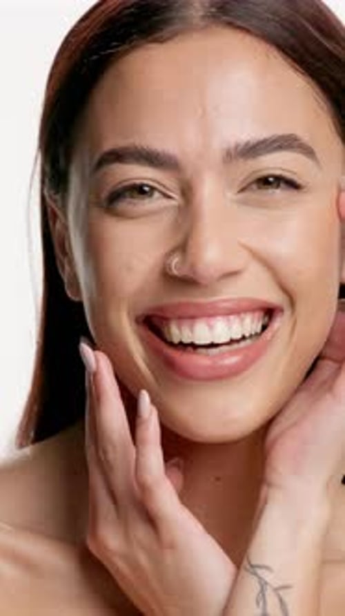 Face, natural skincare and beauty with woman in studio for dermatology, cosmetology and laugh