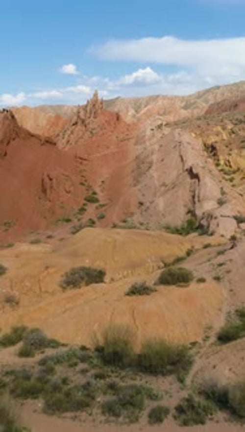 Red Canyon and Blue Sky at Sunny Day Aerial View Vertical Video