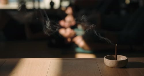 Incense, smoke and meditation in yoga class for peace, mindfulness or holistic wellness