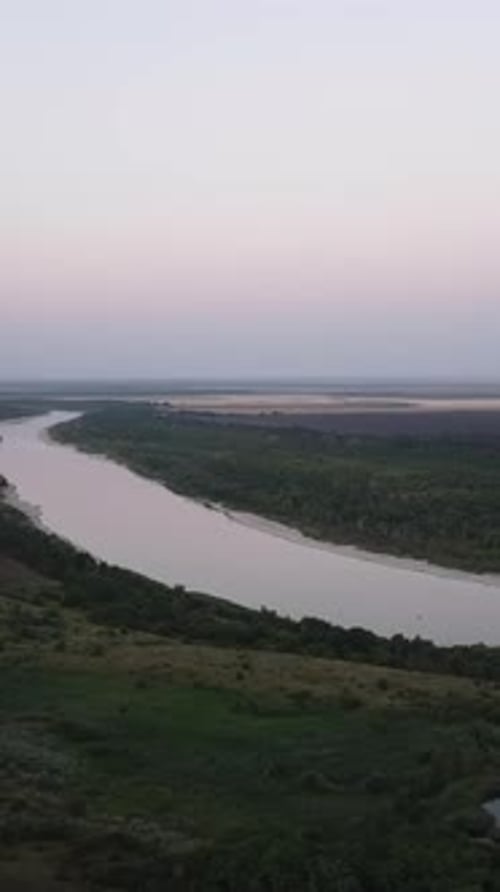 Summer Rural Landscape with a Small Village Forest and River Aerial View Footage Natural Landscape