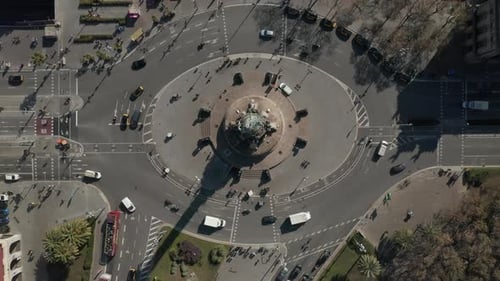 Top Down Static Shot of Vehicles Passing Around Columbus Monument