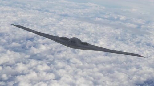 B-2 Stealth Bomber Flying Above Clouds