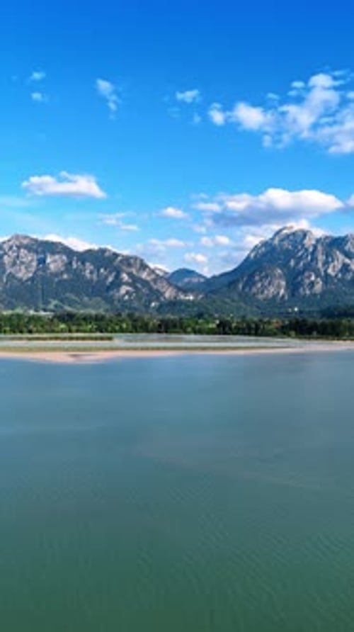 Tourists walk near the Xlendi Tower in Gozo Island, Malta.
