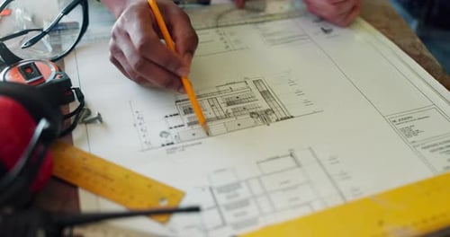 Hands, architect and blueprint with drawing for construction layout, floor plan