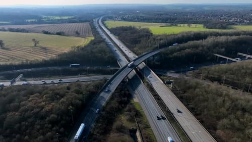 Time Lapse Vehicles Driving on a Highway Interchange Junction Aerial View