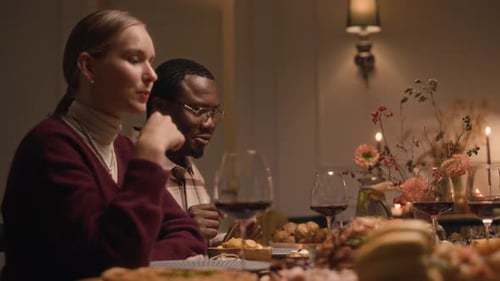 Friends Pass Salad Bowl at Dinner Party
