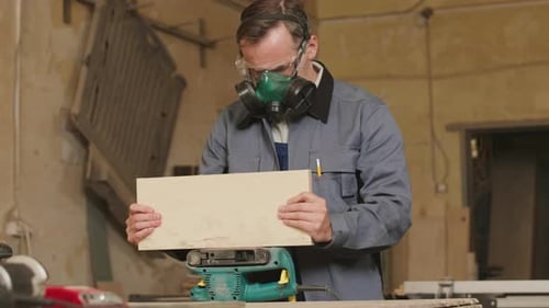 Man Doing Woodwork in Workshop