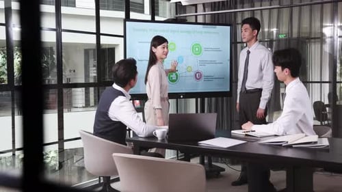 Business Presentation in Modern Office with Colleagues