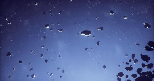 Vast Field of Asteroids Floating in Deep Space During Celestial Exploration
