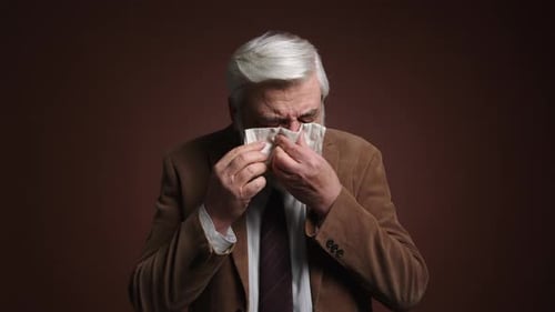 Portrait of a Grayhaired Adult Male Looking Upset and Lonely
