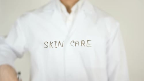 Writing Skin Care on Glass