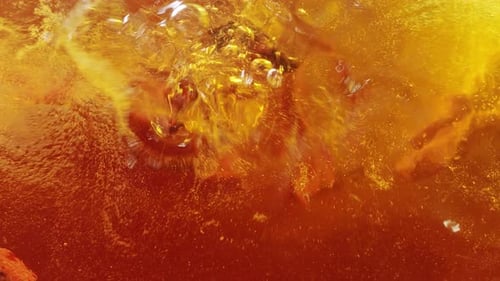 Sow Motion of Pouring Illicium Fall Into the Juice, Tea or Craft Beer or Mulled Wine