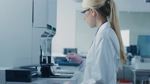 Woman Scientist Working with Lab Equipment