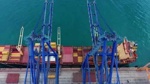 Loading a Container Ship at the Port of a Major Logistics Hub in a Large American City
