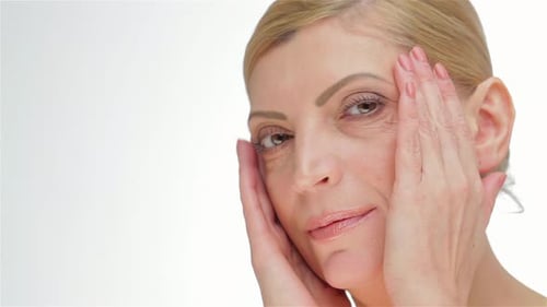 Blonde Woman Touching Face Close Up