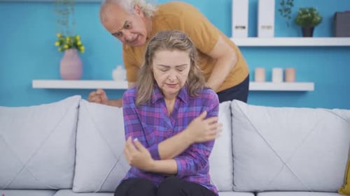 Woman Upset as Man Argues in Living Room