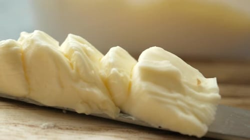 Close Up of Fresh Butter in a Container
