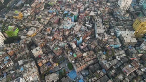 Aerial: shanty town with congested dense buildings, urbanization concept