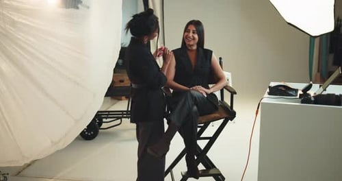 Model Receives Makeup in Fashion Studio