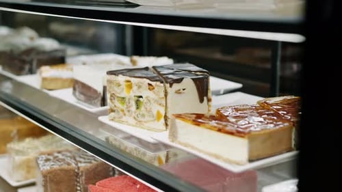 Delicious cakes on the store shelf, bun, bakery
