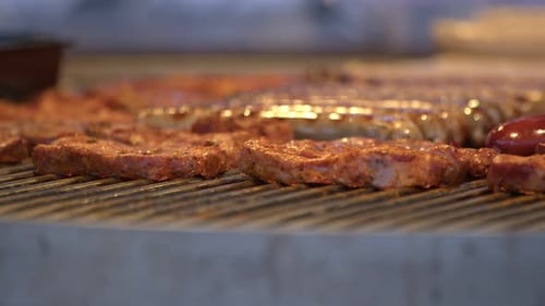 Juicy Meat and Sausages Grilling Close-Up