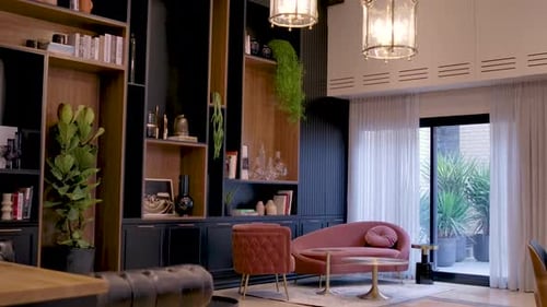 A living room in a luxury elegant flat. Slow forward camera movement.