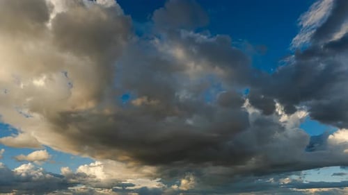 Clouds Race Across The Sky Day Light Fades At Sunset Time Lapse