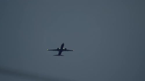 An Airplane Against the Backdrop of Twilight Sky