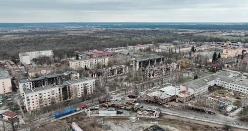 Drone Flying Over a Destroyed District