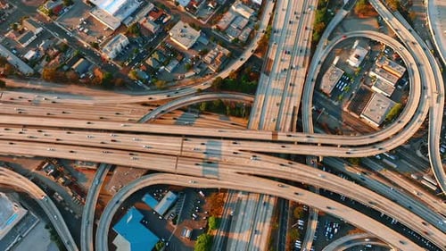 Transport on the highways of a huge interchange. Famous freeway interchange in Los Angeles