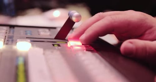 In the television studio, live switching to another camera on the vision mixer