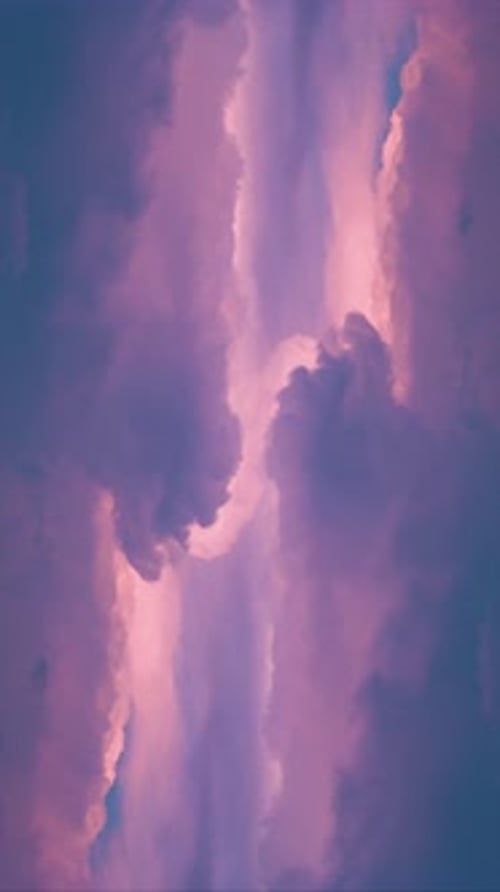 Light Pink and Blue Fluffy Clouds Aerial View