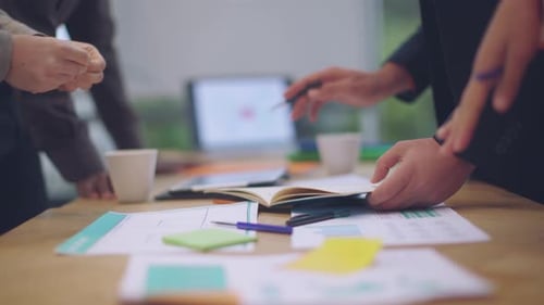 Slow-Motion Shot of Business Professionals Discussing in a Startup Setting