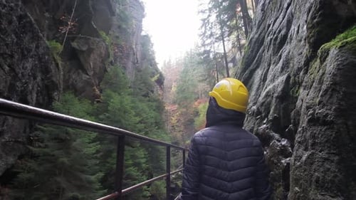 A Male Traveler Walks Through a Mountain Canyon Active Recreation in the Mountainous Area