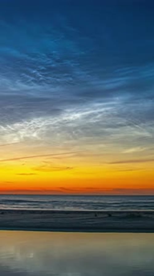 Beach sunset time lapse, vertical video