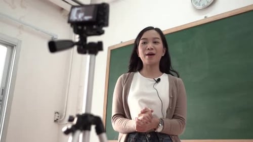 Woman Talking in Classroom Filming Video