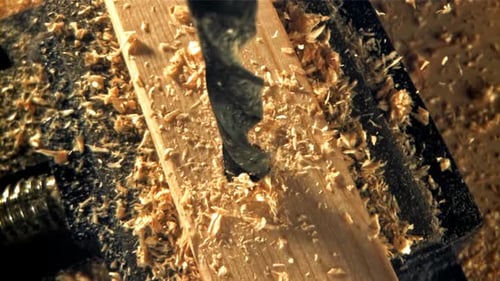 Drill in a Wooden Board Filmed on a Highspeed Camera at 1000 Fps