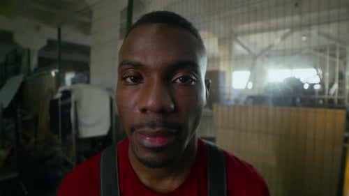 African American Worker In Factory