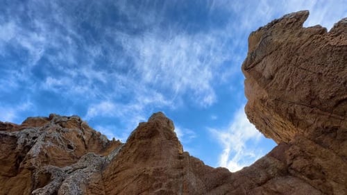 Impressive rock formations against a vibrant blue sky create a breathtaking natural spectacle